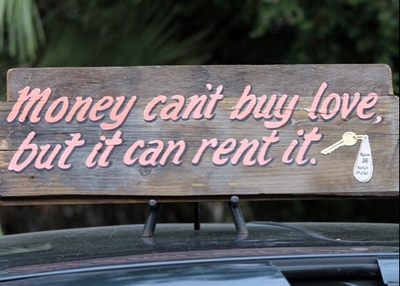  "Money Can't Buy Love, But it Can Rent IT" Wood Sign